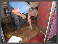 (c)2006 Rick Henn - Dave F. rips out old flooring in Coach #2932. (10K) - CLICK to Enlarge (70K)