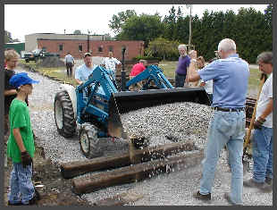 Ford Tractor dumping ballast (15K)